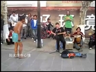 American song attracts beggar to dance in street