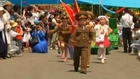 Mini military march on N Korea Children's Day